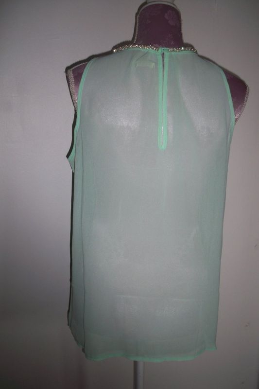 Mintgrön ärmlös blus