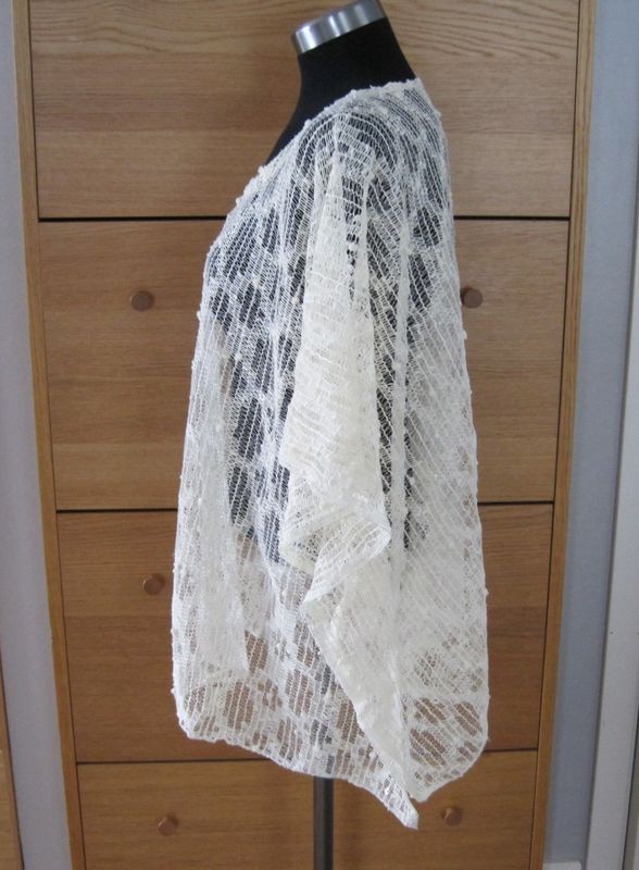 Cremevit Spetsponcho / Nätponcho