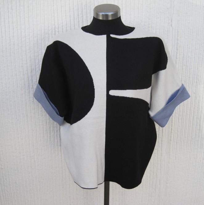 Huvudbild Stickad Tröja Svart Vit Halvlång Ärm